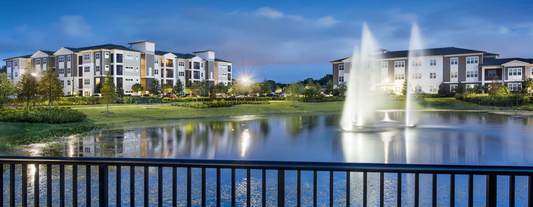 a fountain in a pond