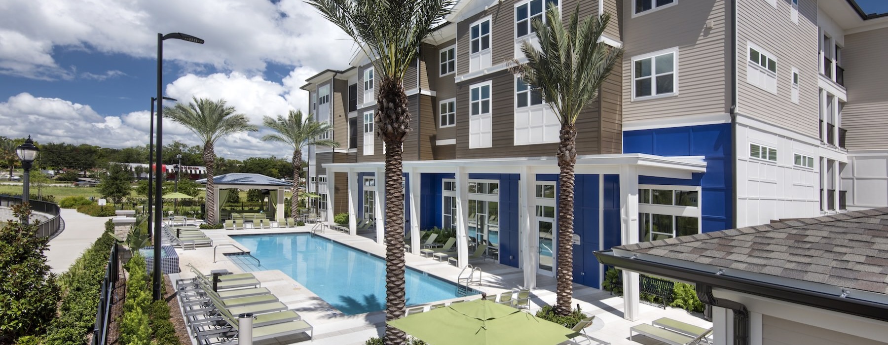 a swimming pool next to a building